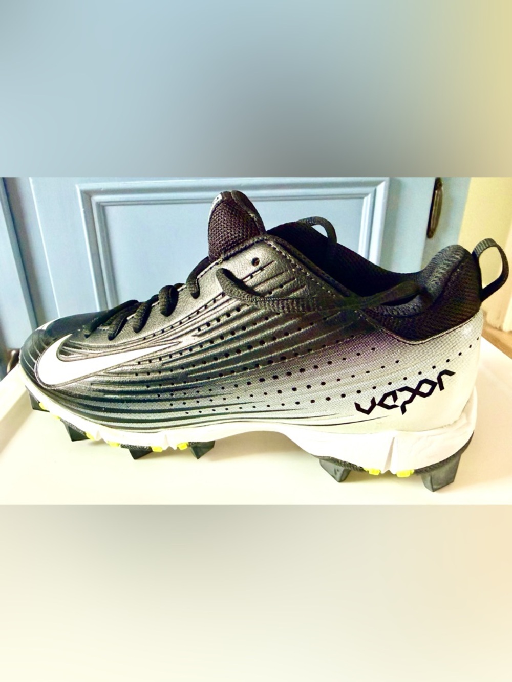 Nike Black and White Youth Baseball Cleats with Yellow Studs